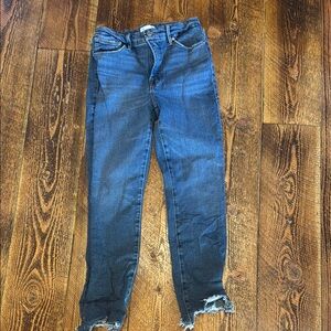 Good American High Rise Blue Jeans with Distressed Hem